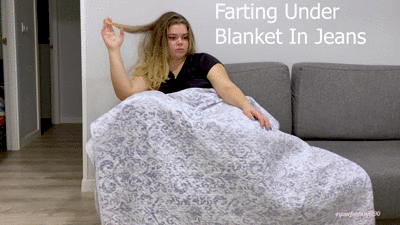 Farting under blanket in jeans