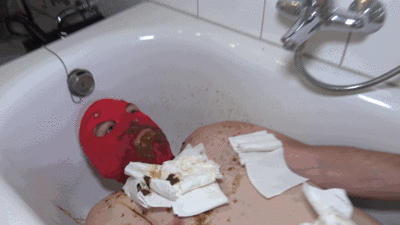 A hot shit bath for our slave