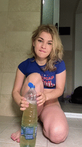 Drinking a bottle of pee