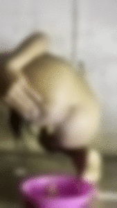 Ebony teen shitting on a plate