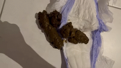 Big thick poo into nappy