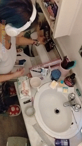 Scrubbing the toilet by hand