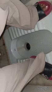 Indian momy doing potty in toilet