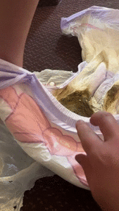 Cleaning up after messing my diaper at dinner