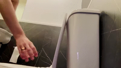 Pissing in a public toilet