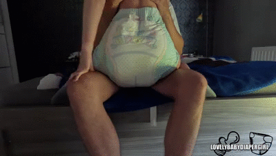 Pooping in a diaper on daddy's lap